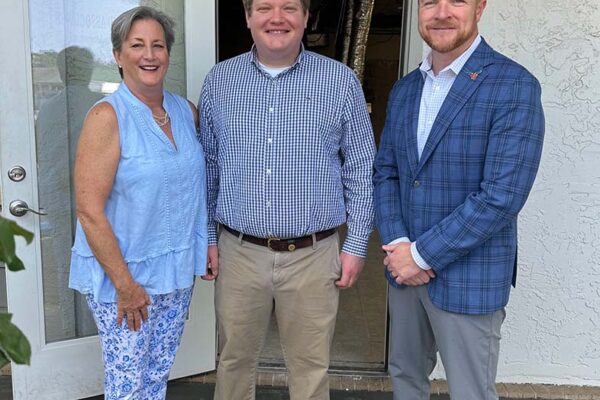 Spanish Fort Mayor Brad Bass and City Councilwoman Mary Brabner commemorating the completion of demolition for the new Bake Blue storefront.